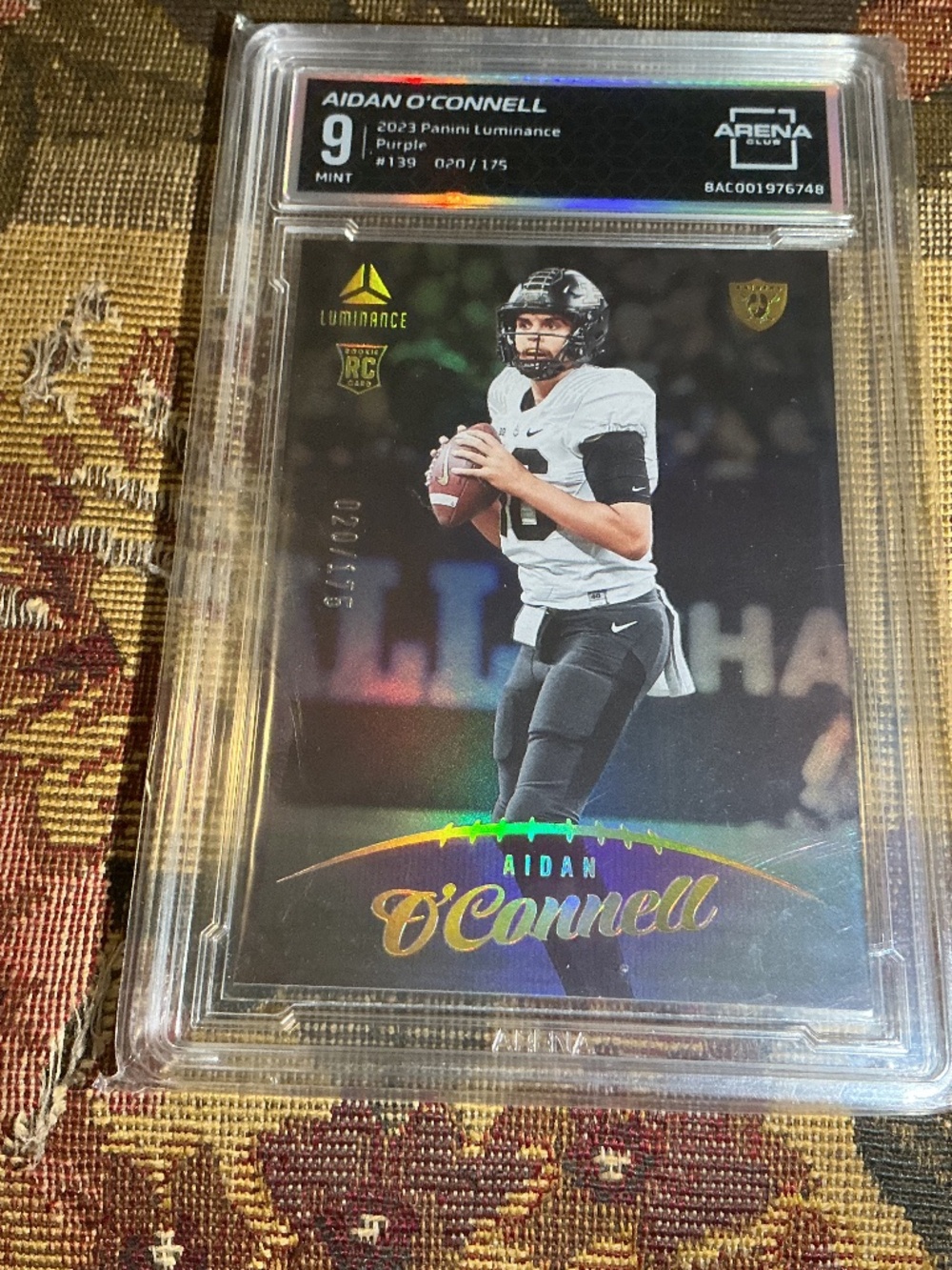 2023 Panini Aidan O'Connell Rookie #'d /175 Purple Luminance RC #139 NFL Arena 9